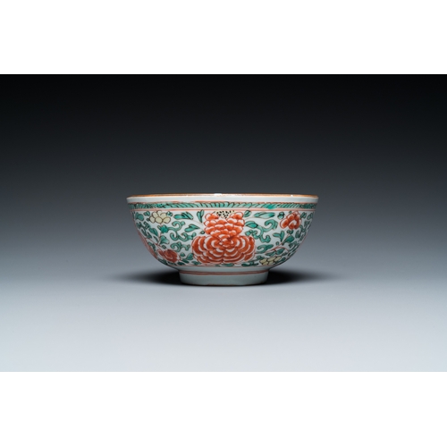 701 - A Chinese famille verte 'cranes' plate and a 'peony scroll' bowl, KangxiDia.: 22 cm (the plate) Dia.... 