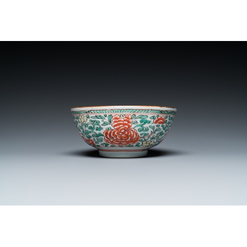 701 - A Chinese famille verte 'cranes' plate and a 'peony scroll' bowl, KangxiDia.: 22 cm (the plate) Dia.... 