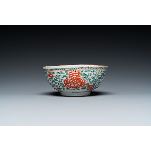 701 - A Chinese famille verte 'cranes' plate and a 'peony scroll' bowl, KangxiDia.: 22 cm (the plate) Dia.... 