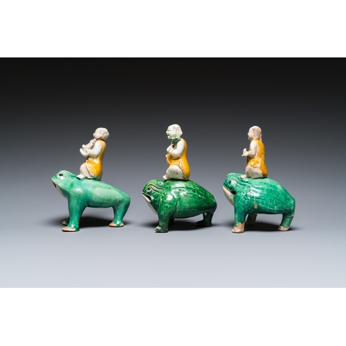 704 - Three Chinese verte biscuit sculptures of Liu Hai on the three-legged toad, KangxiH.: 15 cm
 
 Prove... 