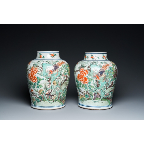 710 - A pair of Chinese famille verte 'pheasant' vases with wooden covers, KangxiH.: 40 cm (incl. wooden c... 