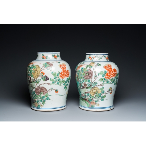 710 - A pair of Chinese famille verte 'pheasant' vases with wooden covers, KangxiH.: 40 cm (incl. wooden c... 