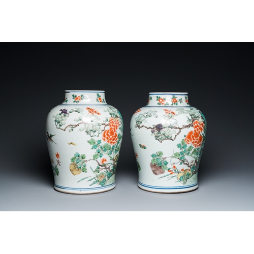 710 - A pair of Chinese famille verte 'pheasant' vases with wooden covers, KangxiH.: 40 cm (incl. wooden c... 