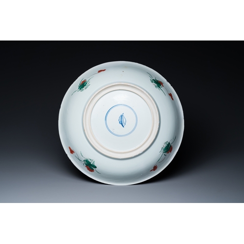 720 - A Chinese famille verte 'qilins and phoenixes' dish, KangxiDia.: 35,5 cm