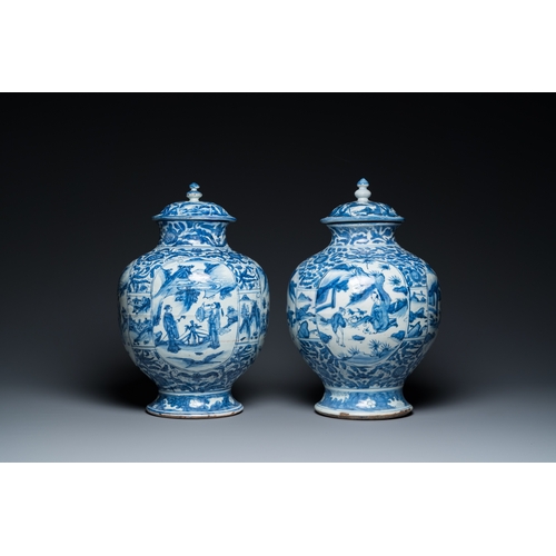 750 - A pair of Chinese blue and white vases and covers with figurative design, MingH.: 41,5 cm (the talle... 