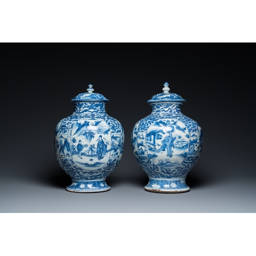 750 - A pair of Chinese blue and white vases and covers with figurative design, MingH.: 41,5 cm (the talle... 