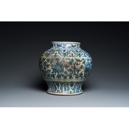 751 - A Chinese blue and white 'guan' jar with lotus scrolls, MingH.: 30 cm