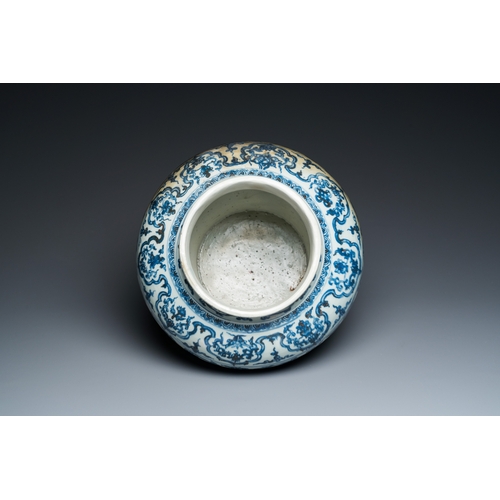 751 - A Chinese blue and white 'guan' jar with lotus scrolls, MingH.: 30 cm