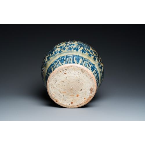 751 - A Chinese blue and white 'guan' jar with lotus scrolls, MingH.: 30 cm