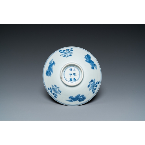 764 - A Chinese blue and white 'Buddhist lions' bowl, Jiajing mark, ShunzhiDia.: 17 cm - H.: 5,5 cm... 