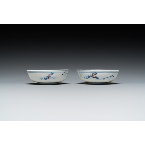 766 - A pair of Chinese blue, white and copper-red semi-eggshell bowls, Xuande mark, WanliDia.: 9,5 cm - H... 