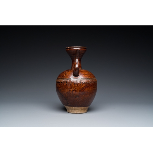 779 - A Chinese brown-glazed ewer, SongH.: 25 cm