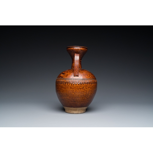 779 - A Chinese brown-glazed ewer, SongH.: 25 cm