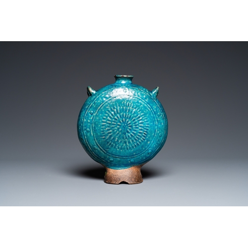 785 - A Chinese fahua 'moonflask' with applied lotus design, MingH.: 20,5 cm
 
 Condition: (UV-checked)- T... 