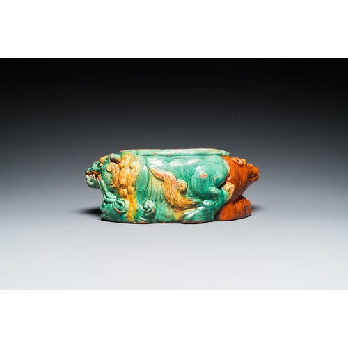 788 - A Chinese sancai-glazed 'three lions' pillow or neck rest, MingDim.: 37 x 15,5 x 14 cm
 
 Provenance... 