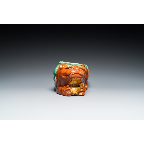 788 - A Chinese sancai-glazed 'three lions' pillow or neck rest, MingDim.: 37 x 15,5 x 14 cm
 
 Provenance... 