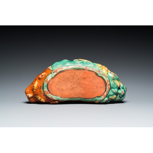 788 - A Chinese sancai-glazed 'three lions' pillow or neck rest, MingDim.: 37 x 15,5 x 14 cm
 
 Provenance... 