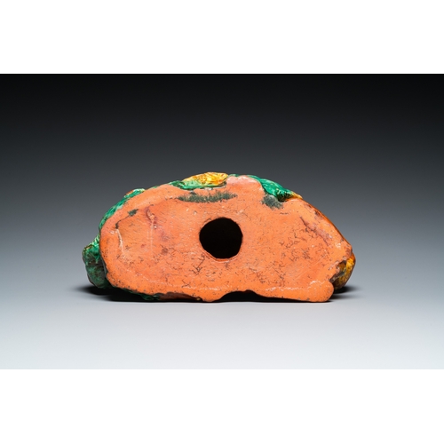 788 - A Chinese sancai-glazed 'three lions' pillow or neck rest, MingDim.: 37 x 15,5 x 14 cm
 
 Provenance... 