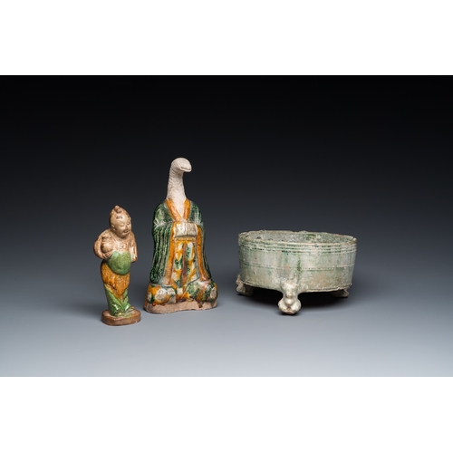 795 - Two Chinese sancai-glazed figures and a green-glazed tripod censer, Han and laterH.: 21 cm (the tall... 