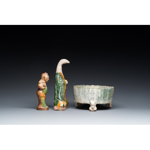 795 - Two Chinese sancai-glazed figures and a green-glazed tripod censer, Han and laterH.: 21 cm (the tall... 