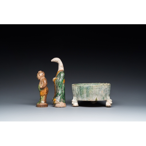 795 - Two Chinese sancai-glazed figures and a green-glazed tripod censer, Han and laterH.: 21 cm (the tall... 