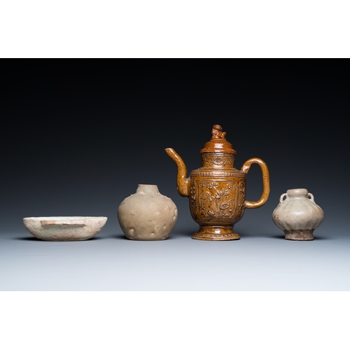 796 - A Chinese qingbai-glazed ear cup, two celadon jarlets and a brown-glazed jug and cover, Han and late... 