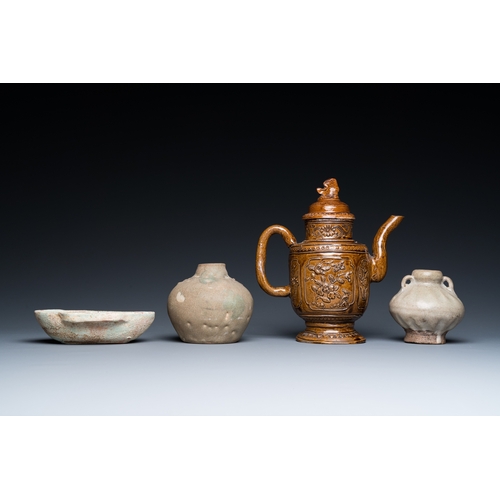 796 - A Chinese qingbai-glazed ear cup, two celadon jarlets and a brown-glazed jug and cover, Han and late... 