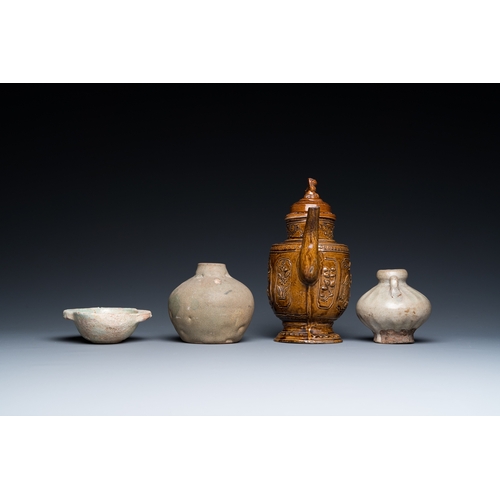 796 - A Chinese qingbai-glazed ear cup, two celadon jarlets and a brown-glazed jug and cover, Han and late... 