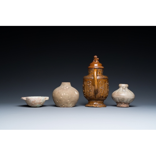 796 - A Chinese qingbai-glazed ear cup, two celadon jarlets and a brown-glazed jug and cover, Han and late... 