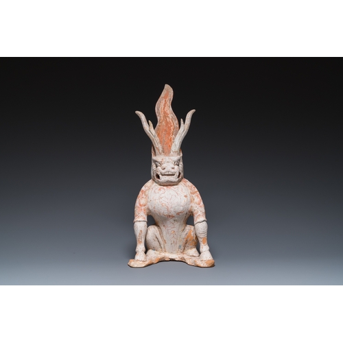 801 - A Chinese painted pottery earth spirit, TangH.: 45 cm
 
 Provenance:- The collection of Mr. and Mrs.... 