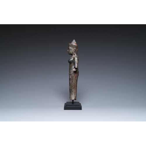 827 - A bronze Khmer sculpture of the goddess Uma, Cambodia, 10/11th C.H.: 42,5 cm (incl. stand) H.: 39 cm... 