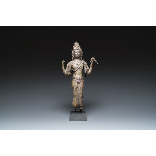 835 - A Javanese bronze Majapahit sculpture of the god Shiva, Indonesia, probably 14th C.H.: 46 cm (incl. ... 