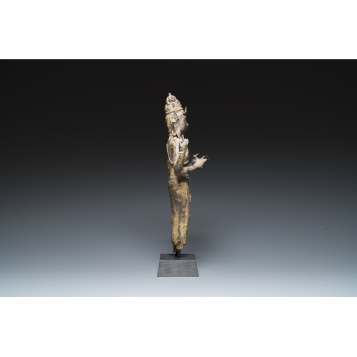 835 - A Javanese bronze Majapahit sculpture of the god Shiva, Indonesia, probably 14th C.H.: 46 cm (incl. ... 