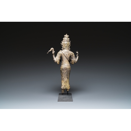 835 - A Javanese bronze Majapahit sculpture of the god Shiva, Indonesia, probably 14th C.H.: 46 cm (incl. ... 