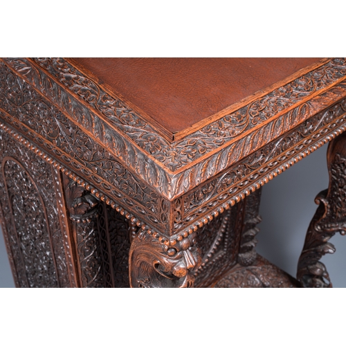 840 - A colonial Anglo-Indian reticulated wooden desk with hidden compartment, 19th C.H.: 123 cm - W.: 65 ... 