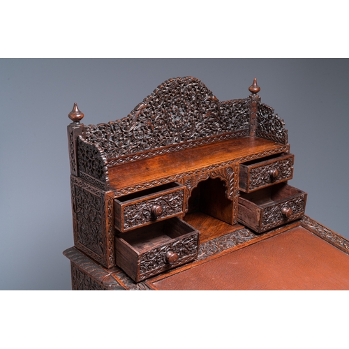 840 - A colonial Anglo-Indian reticulated wooden desk with hidden compartment, 19th C.H.: 123 cm - W.: 65 ... 