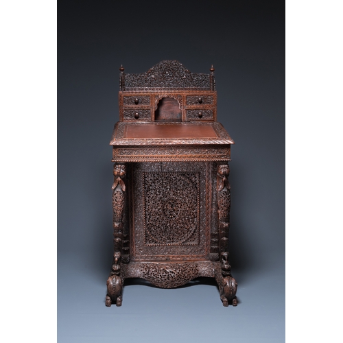 840 - A colonial Anglo-Indian reticulated wooden desk with hidden compartment, 19th C.H.: 123 cm - W.: 65 ... 