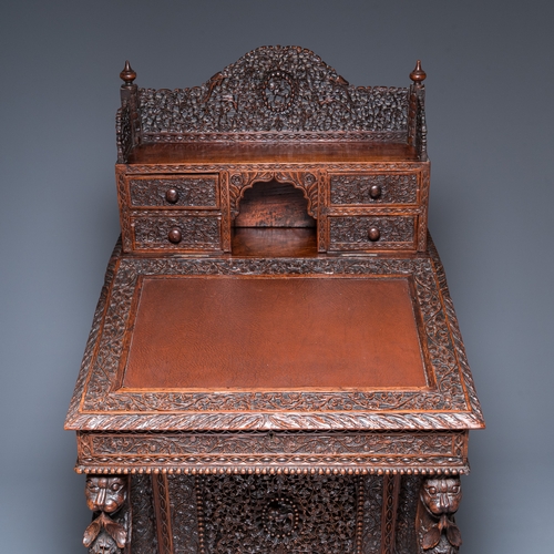 840 - A colonial Anglo-Indian reticulated wooden desk with hidden compartment, 19th C.H.: 123 cm - W.: 65 ... 