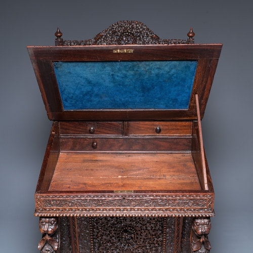 840 - A colonial Anglo-Indian reticulated wooden desk with hidden compartment, 19th C.H.: 123 cm - W.: 65 ... 