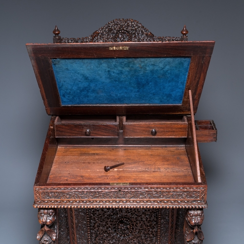 840 - A colonial Anglo-Indian reticulated wooden desk with hidden compartment, 19th C.H.: 123 cm - W.: 65 ... 