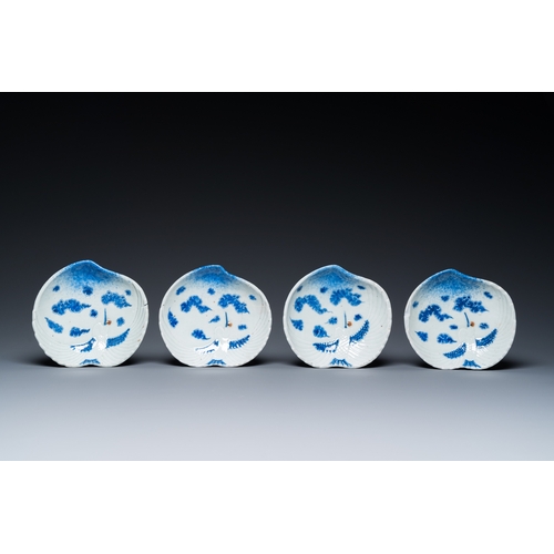 846 - Four Japanese blue and white peach-shaped 'crane' dishes standing on three feet, Edo, 18/19th C.Dia.... 