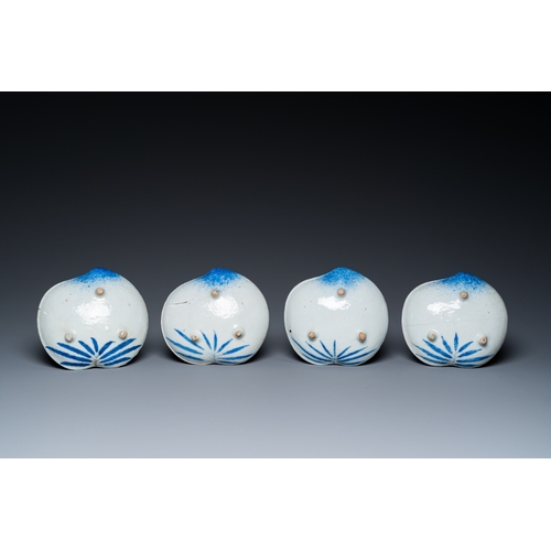 846 - Four Japanese blue and white peach-shaped 'crane' dishes standing on three feet, Edo, 18/19th C.Dia.... 