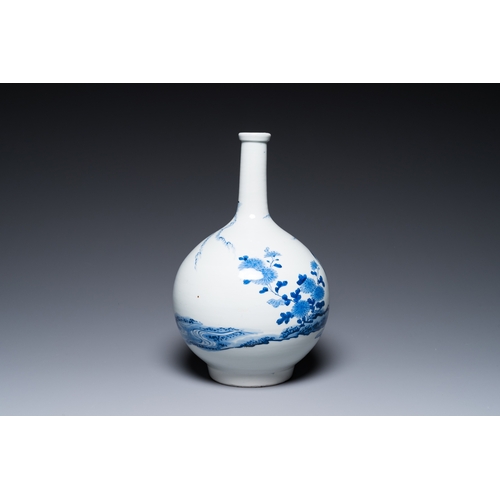 847 - A Japanese blue and white bottle vase with a lady in a landscape, Edo, 17/18th C.H.: 35 cm... 