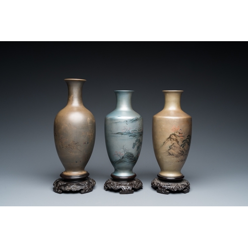 874 - Three Chinese Fuzhou or Foochow lacquer 'landscape' vases on stands, 2nd half 20th C.H.: 27 cm (the ... 