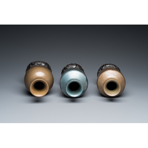 874 - Three Chinese Fuzhou or Foochow lacquer 'landscape' vases on stands, 2nd half 20th C.H.: 27 cm (the ... 