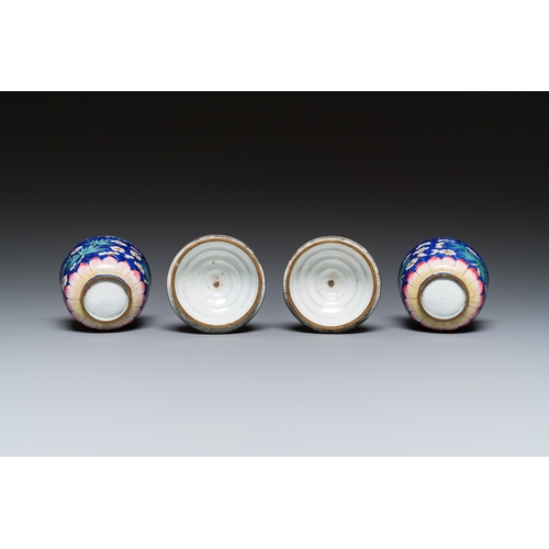 901 - A pair of Chinese blue-ground Canton enamel covered bowls on stands, QianlongH.: 10 cm - Dia.: 7,5 c... 