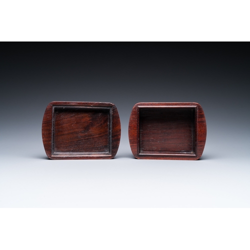 910 - A Chinese huali box and cover, a burl wood-topped stand, a table screen mirror and a pair of Buddhis... 