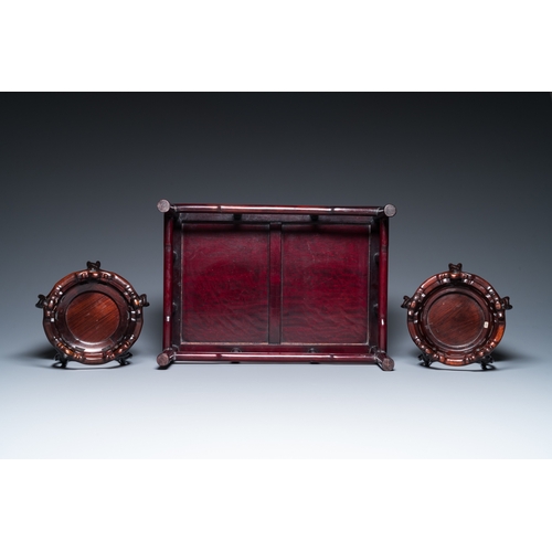 915 - Five Chinese well-carved wooden stands, 20th C.Dim.: 45,5 x 32 x 16,5 cm (the rectangular stand)Dim.... 