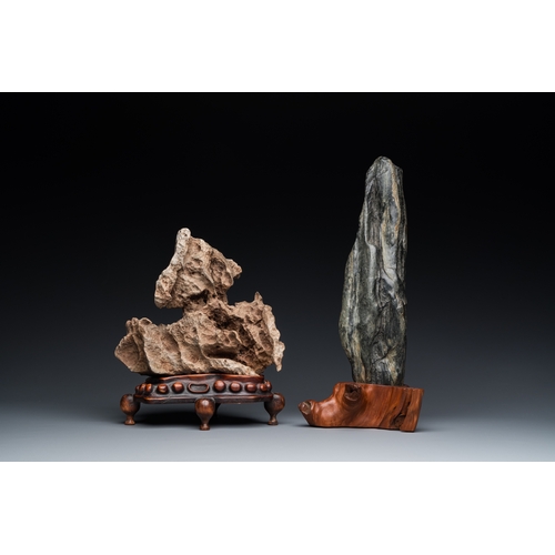 921 - Two Chinese 'gongshi or 'scholar's rocks' on wooden stands, Ming or laterH.: 34 cm (the tallest, inc... 