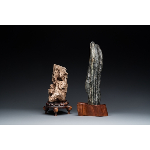 921 - Two Chinese 'gongshi or 'scholar's rocks' on wooden stands, Ming or laterH.: 34 cm (the tallest, inc... 